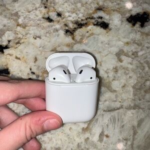 Apple AirPods + Charging Case